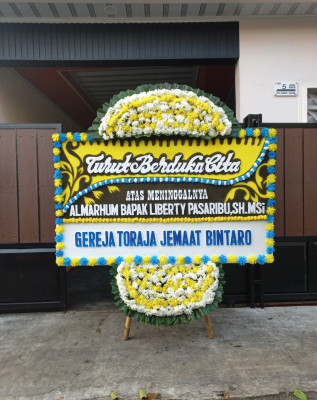 Papan Bunga Duka di Blega